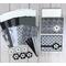A card making to kit with black and white scrapbook paper, cardstock, flower embellishments, ribbons and cards and envelopes.